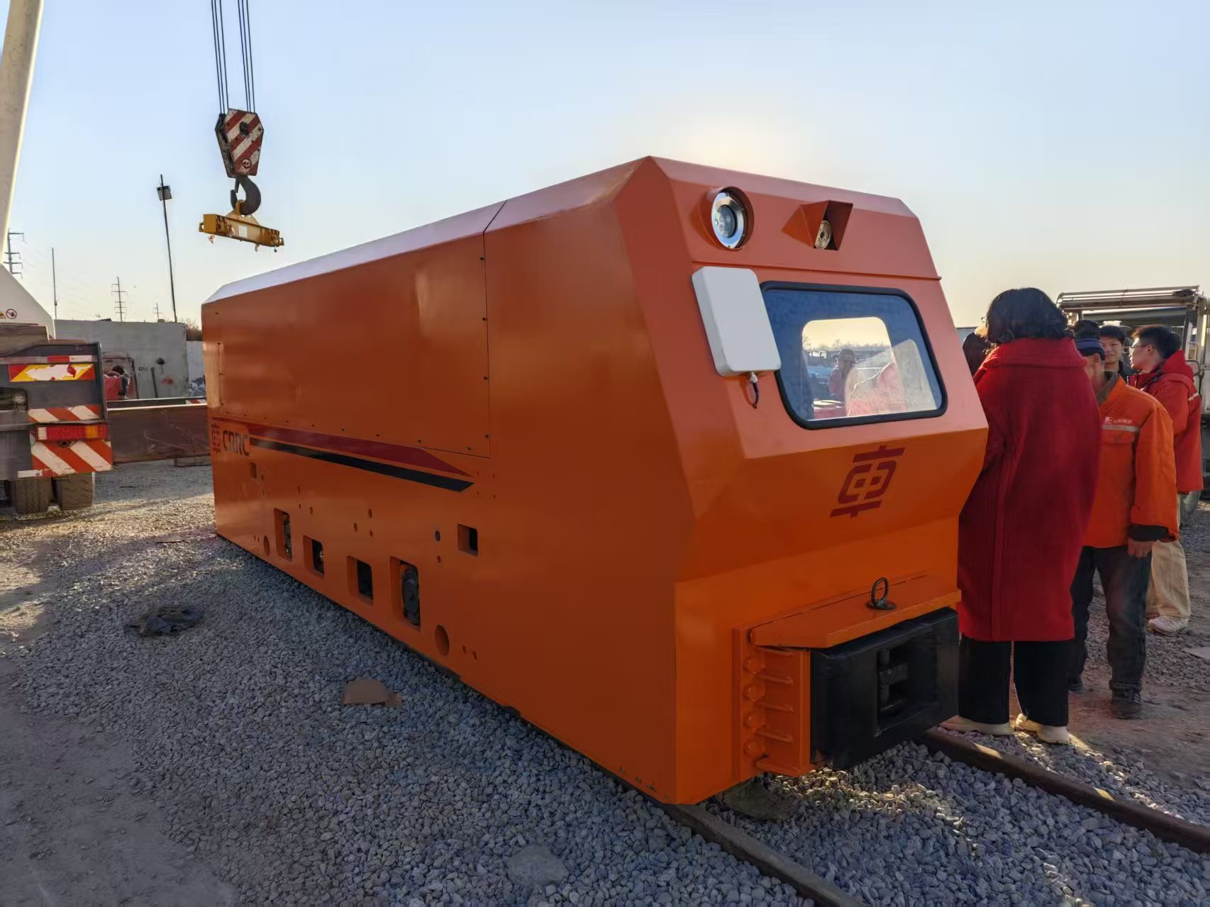 CRRC-built inspection vehicle arriving at the mine, lifted into position by crane